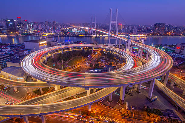 istock Spirals of Light: Nanpu Bridge Interchange at Dusk, Shanghai, China 2210789144