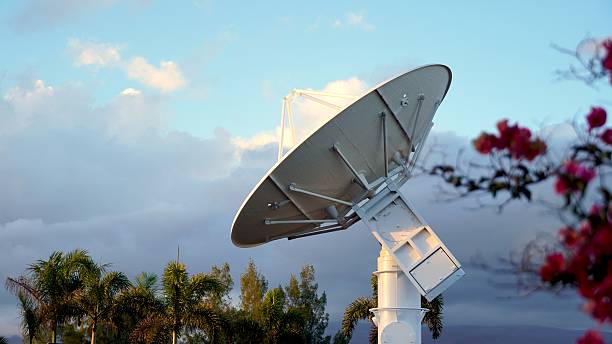 Parabolic antenna pointing at the sky, capturing data for space exploration