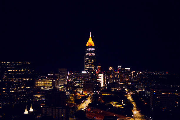 Night urban landscape of downtown district of Atlanta city in Georgia, USA. Skyline with brightly illuminated high skyscraper buildings in modern american megapolis.