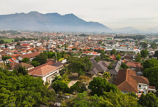 istock View of Garut city, downtown area, seen from above. Garut is a district city in West Java, Indonesia, known as the Swiss van Java, with a beautiful landscape surrounded by mountains. 2210798886