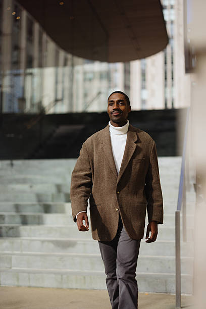 istock Confident Professional Walking Outdoors on a Sunny Day in Business Attire 2210800722