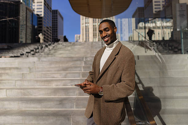 istock Confident Professional Smiling Outdoors in Urban Setting on Sunny Day 2210800762