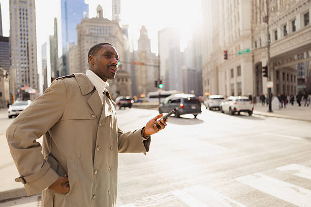 istock Professional Man Using Smartphone in Urban City Street Environment 2210800844