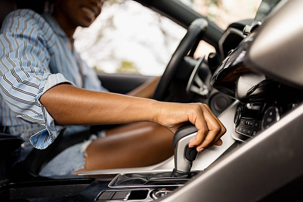 istock Driver Operating Gear Shift in a Modern Vehicle Interior Environment 2210800966