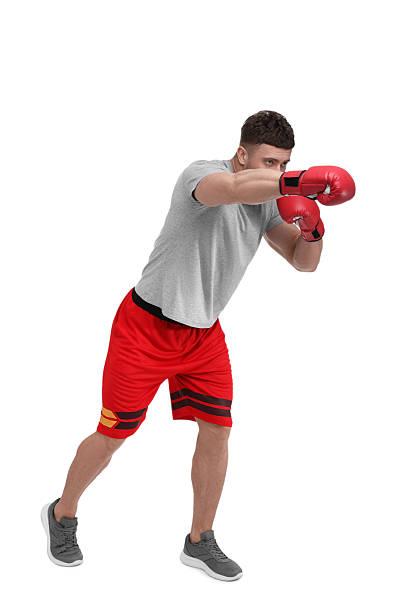 istock Man in boxing gloves fighting on white background 2210803353