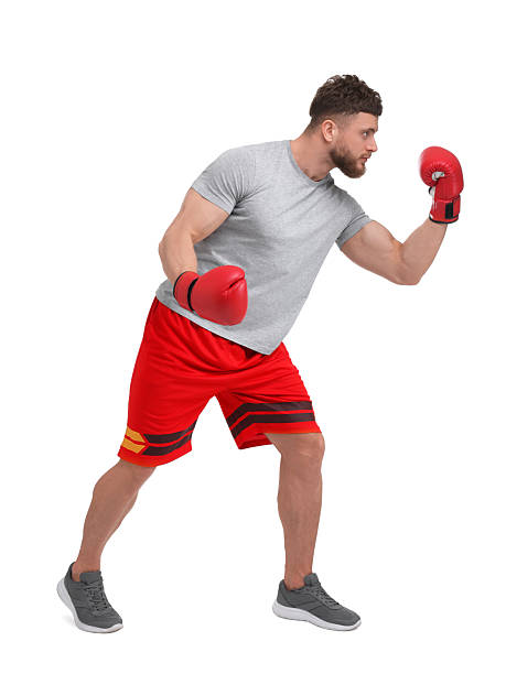istock Man in boxing gloves fighting on white background 2210803359