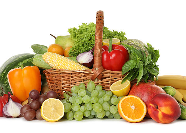 istock Different fresh fruits and vegetables in wicker basket isolated on white 2210803985