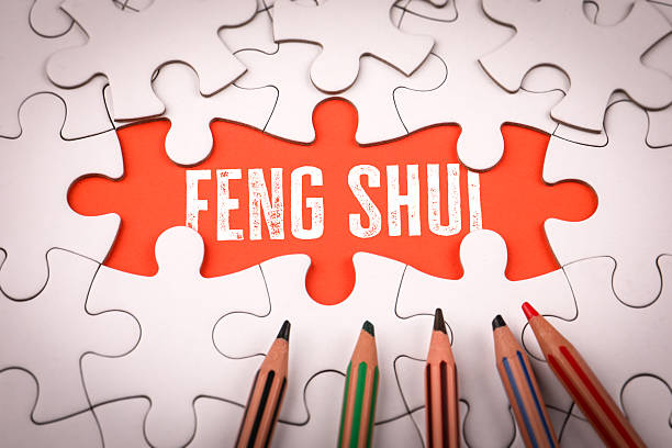 istock Feng Shui. White puzzle pieces and colored pencils 2210805817