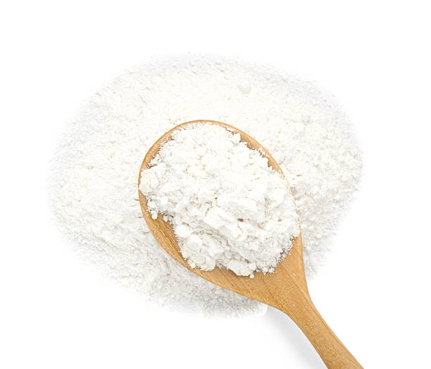 istock Baking powder in spoon isolated on white, top view 2210806909