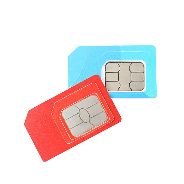 istock Two SIM cards isolated on white, top view 2210807337