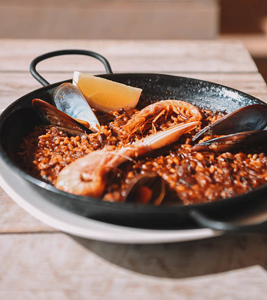 istock Seafood paella in a pan 2210807366