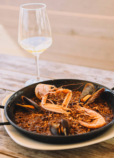 istock Seafood paella in a pan 2210807477