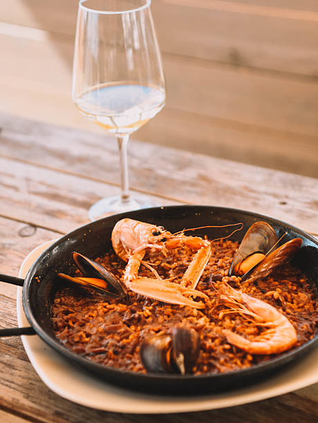 istock Seafood paella in a pan 2210807482