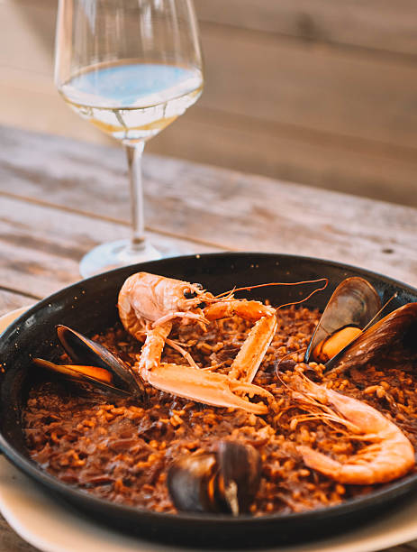 istock Seafood paella in a pan 2210807483