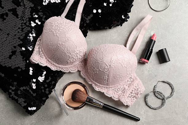 istock Beautiful lace bra and accessories on grey background, flat lay 2210808190