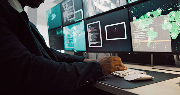 istock Computer, security and person on screen for surveillance, global investigation and protection. Satellite, law enforcement and man on monitor for inspection, safety service or search for online threat 2210808745