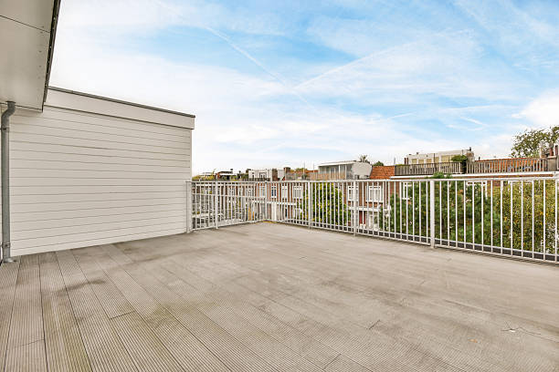 exterior of a large balcony with a street view