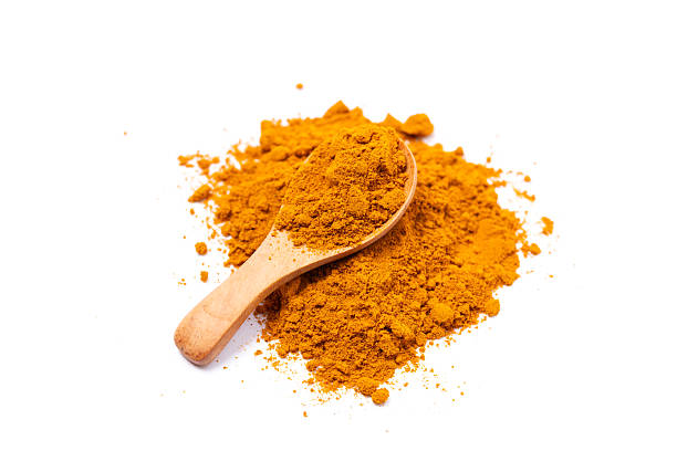 istock Dry Turmeric powder and turmeric root isolated on white background ,Top view 2210814866