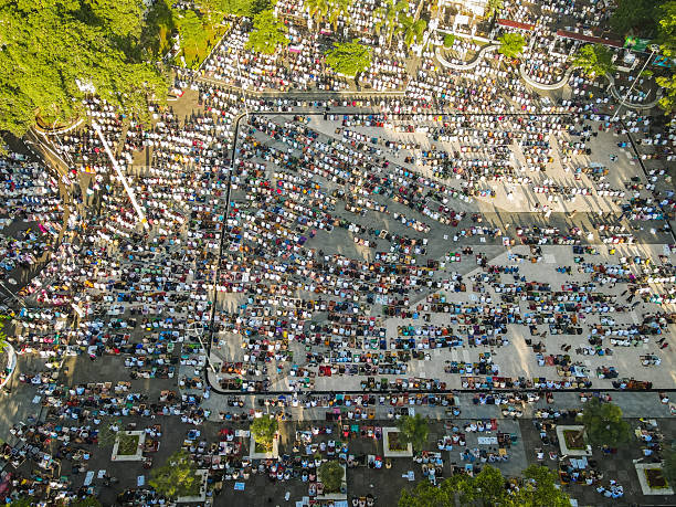 istock The Muslim community in Garut Regency, Indonesia, together performs Eid prayers in the courtyard of the Grand Mosque of Garut Regency, which is also the town square of Garut, seen from above. 2210814934
