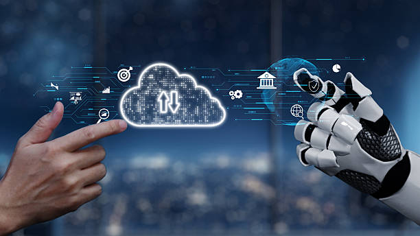 istock Hands of human and robot connecting through cloud technology, showcasing digital upload and advancement in artificial intelligence and data management. Auvana 2210814983