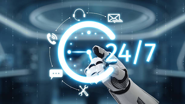 istock Futuristic robotic hand interacting with digital clock and 24-7 icons representing constant availability and technology in modern communication, efficiency, and service. Auvana 2210815033