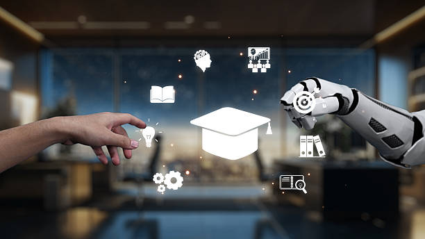 istock Human hand reaching towards robotic hand with educational icons symbolizing the future of learning and technology integration in modern classrooms and workplaces. Auvana 2210815696