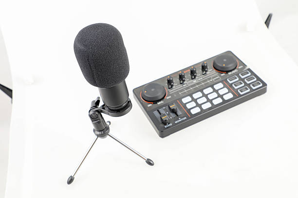 istock Microphone and music mixer on white background. 2210818230