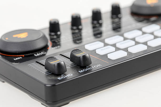 istock Microphone and music mixer on white background. 2210818265