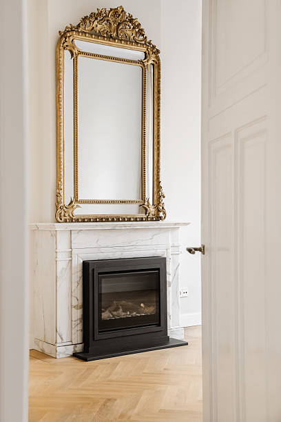 istock An amazing room with a black fireplace and a large mirror 2210818706