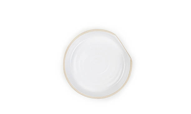 istock Top view, White-brown ceramic plate concave-mouth round plate for snack isolated on white background. 2210819795