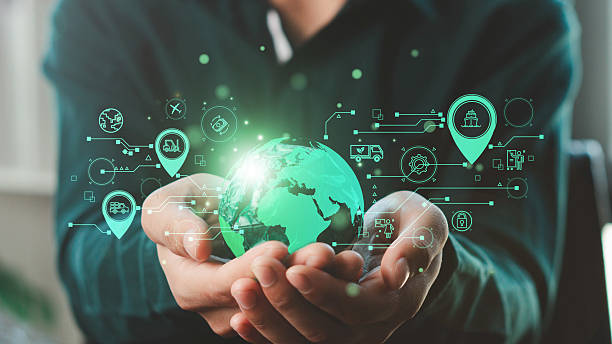istock Businessman hand holding virtual green globe with green logistics icon representing eco-friendly transportation. Green logistic or Sustainable transport. sustainable logistics. 2210823767