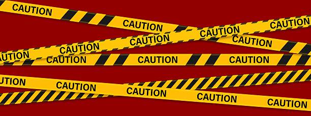 istock Caution warning tape. Police warning crossed ribbon. Caution sign yellow black strip for danger zone, construction area and crime scene. 2210825681