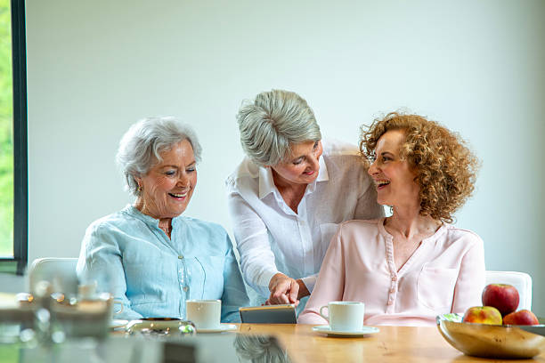 istock Senior Mother and two daughters portrait 2210826348