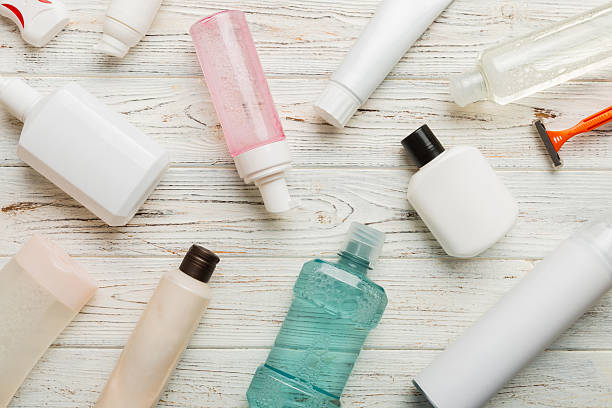 istock Mockup for bathing products top view flat lay, spa razor, toothpaste, soap, gel and other various accessories. Cosmetics for skin health. Bath Mockup for your logo 2210826700