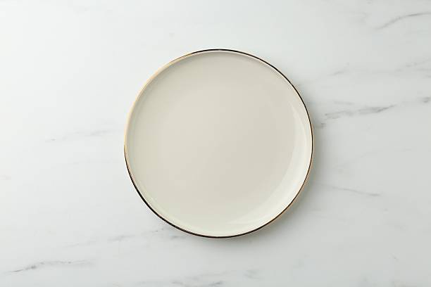 istock Stylish plate on white marble table, top view 2210826825