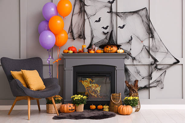 istock Stylish room interior with festive decor. Halloween celebration 2210829023