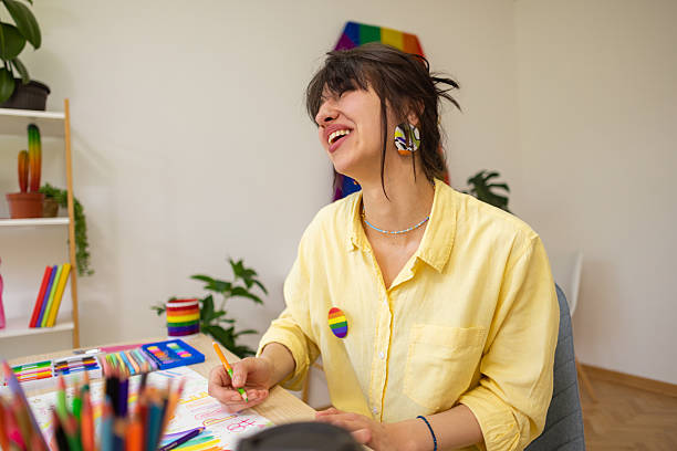 istock Woman Designing Pride Poster 2210830222