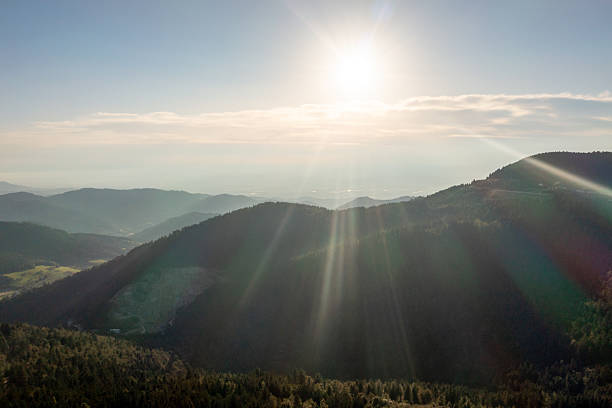 Sunset scenery in the Black Forest Mountains, in Baden Wurttemberg, Germany, drone aerial view