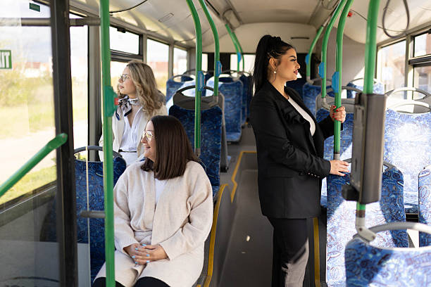 istock The women riding on a city bus. 2210832190