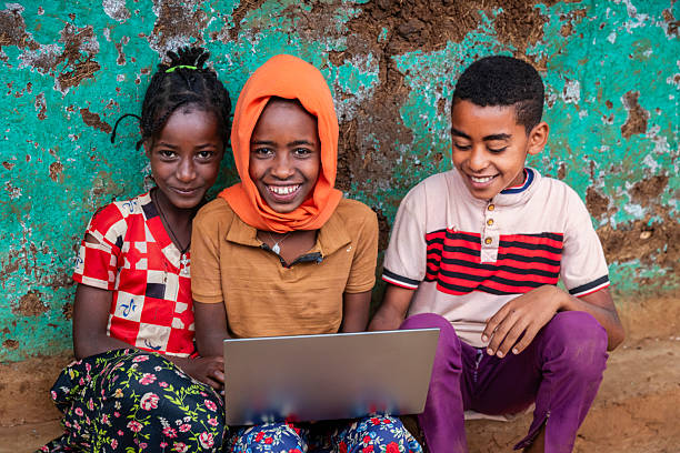 istock African children using laptop, East Africa 2210834508