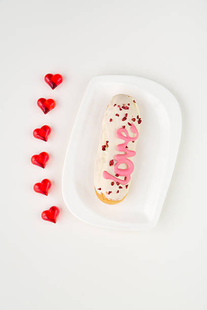 istock Delicious donut decorated with love and hearts for a festive celebration in a bright setting 2210841487