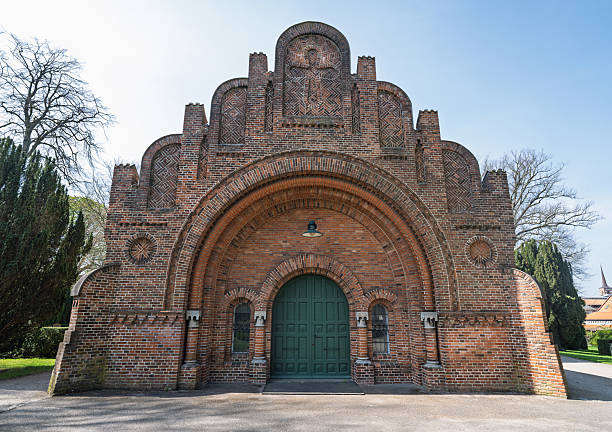 Roskilde, Denmark - April 17, 2025: The beautiful Greyfriars Cemetery chapel in Greyfriars Cemetery was built in 1855.
