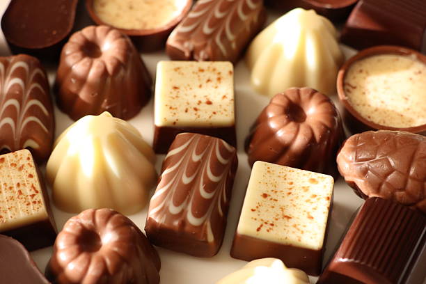 A selection of assorted gourmet chocolates presented beautifully in a decorative box
