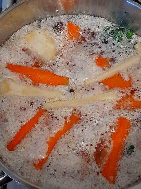 istock Chicken soup with vegetables and foam 2210856265