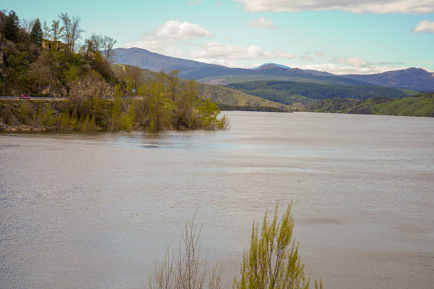 Water reservoir, mountains in the background.