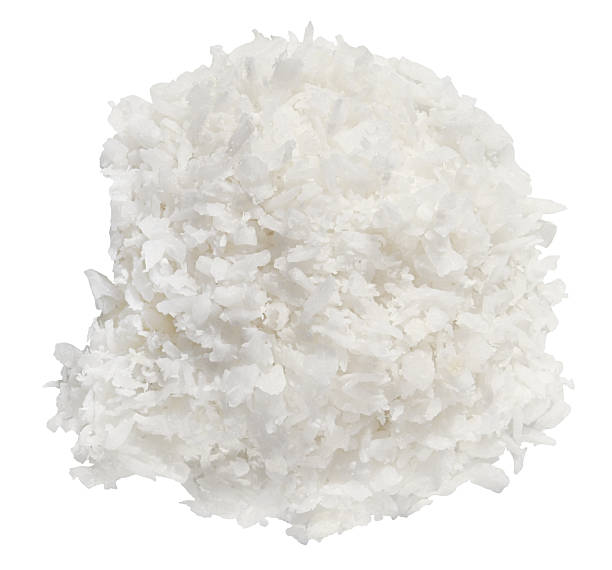 istock Pile coconut flakes isolated on a white background. Top view. Completely in focus. Full depth of field. 2210862055