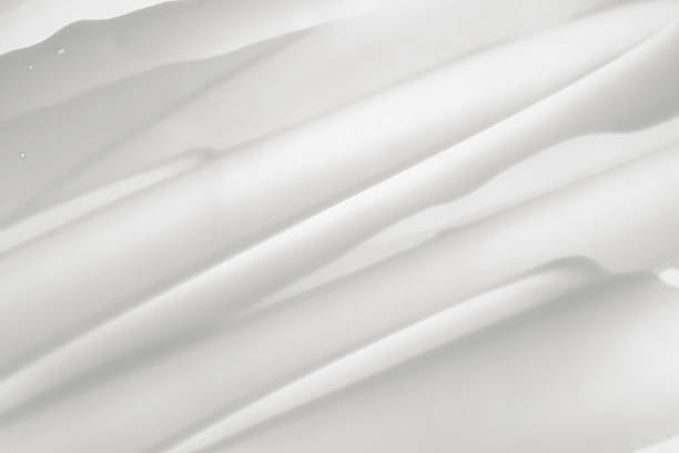 istock Macro texture of white cream on a white background 2210862178
