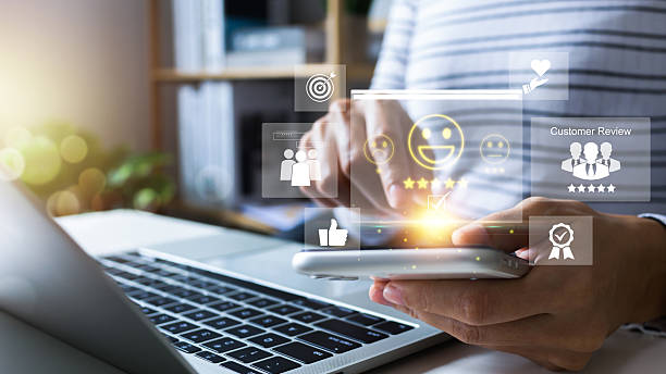 istock Customer use smartphone to Submit Customer Feedback with Digital Satisfaction Ratings. Customer Service, and Online Consumer Interaction in Business Platform, Featuring Virtual Icons for Positive Review. 2210862426