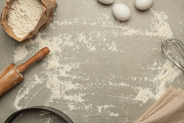 istock Gray stone background with flour and cooking tools 2210863281