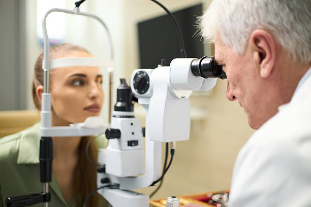istock Performing Eye Examination with Medical Device 2210865119